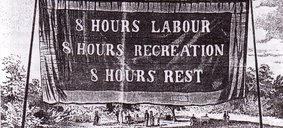 El lema de la pancarta fue uno de los lemas de la huelga general de 1886. ¿De cuántas horas era la jornada laboral de los trabajadores durante la Revolución Industrial en EEUU?